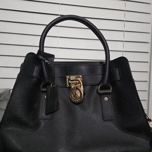 Michael Kors Black Satchel with Gold Accents